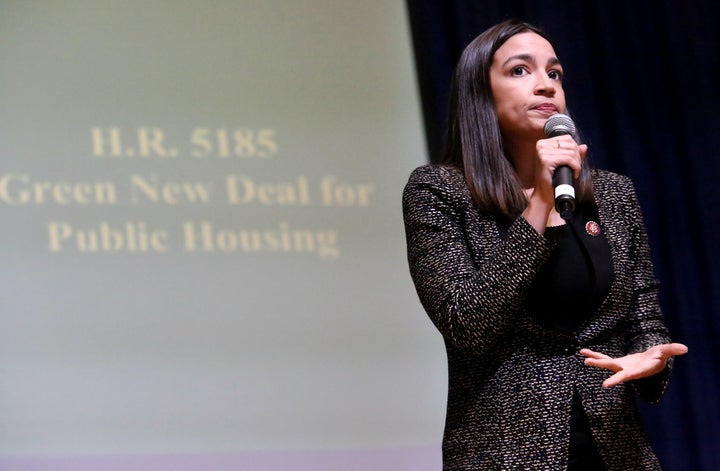 Rep. Alexandria Ocasio-Cortez (D-N.Y.) speaks to residents in Queens about her bill to invest in greening the city's public housing complexes — legislation Stringer vowed to champion if elected mayor.