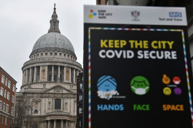 Covid-19 signage in front of St Paul's Cathedral, after Mayor of London Sadiq Khan declared a 