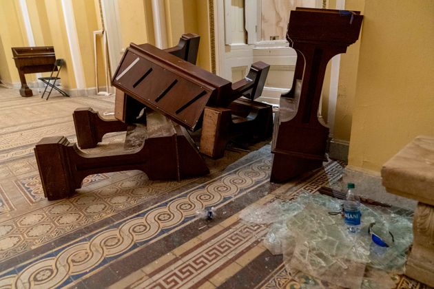 Damage is visible in the hallways of the Capitol early Thursday after protesters stormed the building a day earlier.