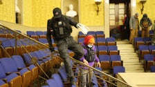 FBI Arrests 2 Men Seen With Zip Tie Restraints During U.S. Capitol Riot