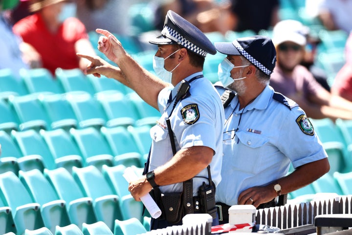 Police monitor the crowd following a complaint by Mohammed Siraj of India about spectators during day four of the Third Test match in the series between Australia and India at Sydney Cricket Ground on January 10, 2021 in Sydney, Australia. 