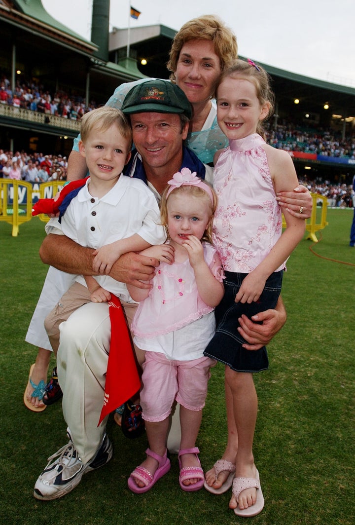 Former Australian cricket captain Steve Waugh poses for photo with his family, wife Lynette, son Austin and daughters Lilley, and Rosie, right, after his final test match against India at the Sydney Cricket Ground, Tuesday, Jan 6, 2004.