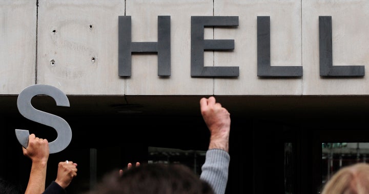 Environmental protesters demonstrate outside the Shell headquarters building in London. 