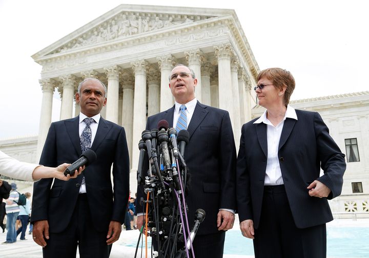 David Frederick, pictured in the center, seen in 2008 outside the Supreme Court, where he was arguing a case on behalf of the now-defunct TV startup Aereo. 