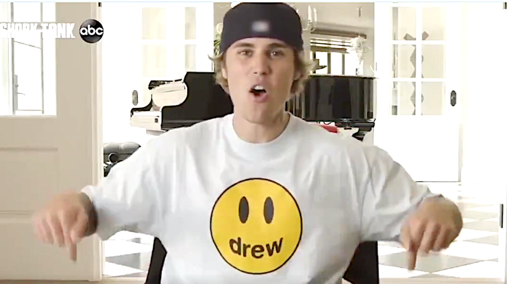 Justin Bieber Flexes Abs, Shoots Basketball To Hawk Chair On 'Shark