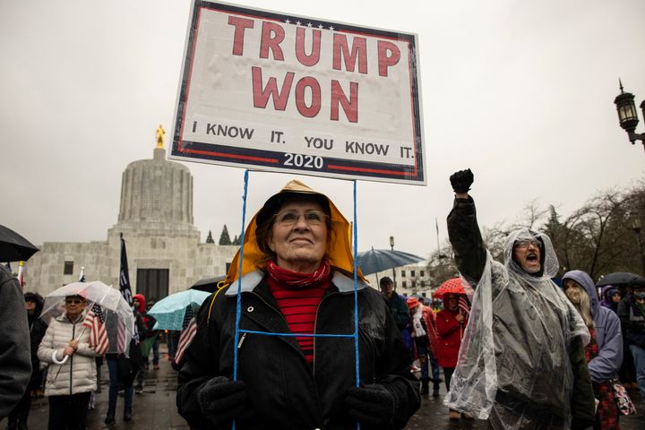 A protester outside the Oregon state capitol in Salem, where demonstrators breached the legislative building in December. The FBI has warned local law enforcement agencies that potentially violent protests could occur in state capitals nationwide in the days before President-elect Joe Biden is inaugurated on Jan. 20.