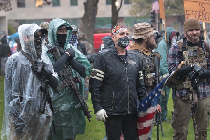 Gun-toting protesters rallied outside the Michigan state capitol this spring to demonstrate against Gov. Gretchen Whitmer's COVID-19 orders. In April, armed protesters stormed the Michigan state Capitol, and authorities later foiled a plot to kidnap Whitmer.