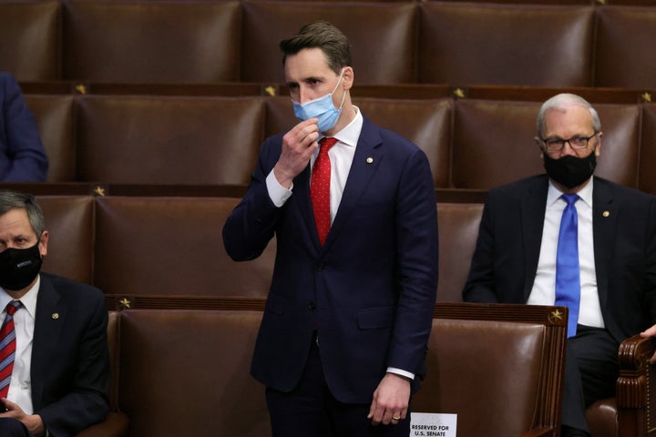 Sen. Josh Hawley (R-Mo.) in the House chamber on Jan. 6. Members returned to chamber after being evacuated when insurrectionists stormed the U.S. Capitol and disrupted a joint session to ratify President-elect Joe Biden's Electoral College win over President Donald Trump. Hawley helped incite the riot.