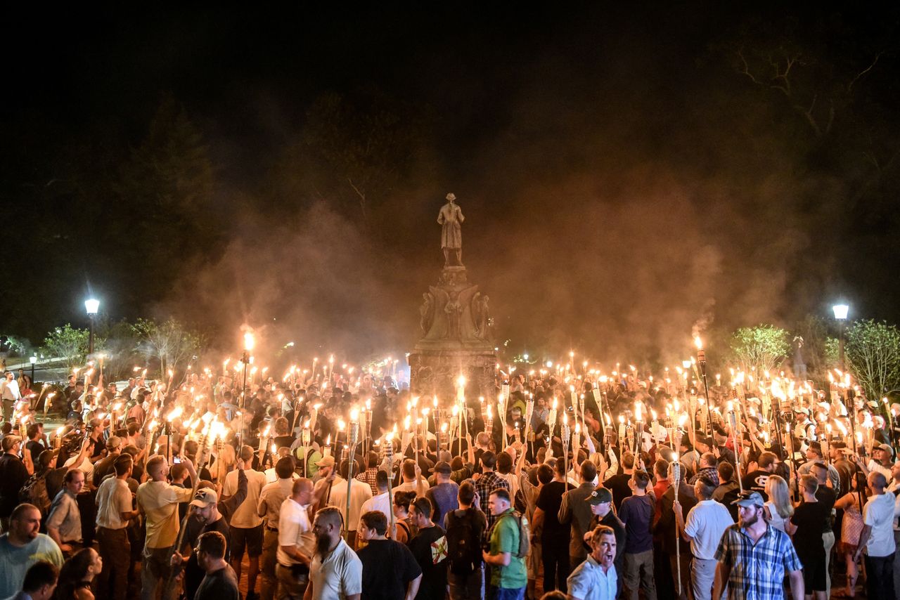 White nationalists participate in a torch-lit march on the grounds of the University of Virginia ahead of the Unite the Right Rally in Charlottesville, Virginia on Aug. 11, 2017.
