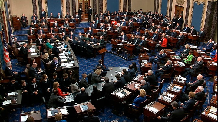 The Senate voting on Trump's first impeachment in February 2020. Sen. Mitt Romney (R-Utah) cast the lone vote to convict by a