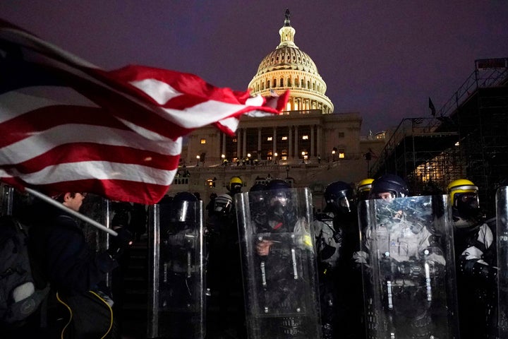 Police in riot gear in front of the U.S. Capitol on Jan. 6