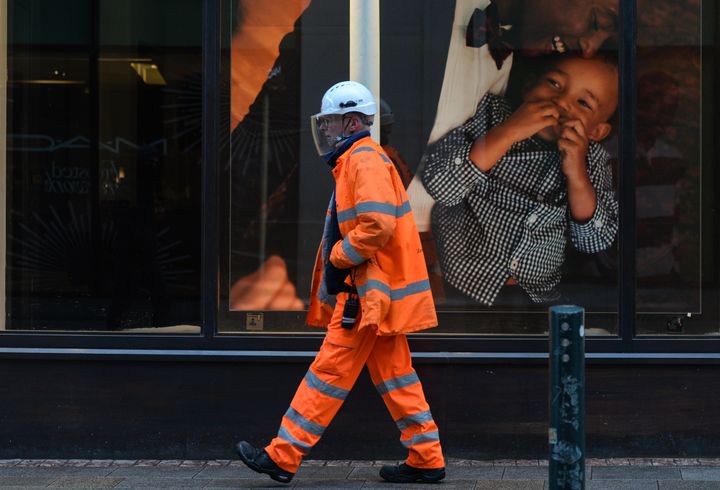 Workers are "terrified" after the government insisted construction and manufacturing can continue despite the soaring infection and death rates.