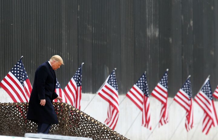 President Donald Trump walks down the steps before a speech near a section of the U.S.-Mexico border wall, Tuesday, Jan. 12, 2021, in Alamo, Texas. (Delcia Lopez/The Monitor via AP)