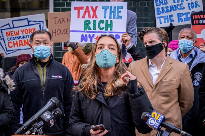 New York State Sen. Julia Salazar (D) speaks in support of taxing the rich on Jan. 5. Salazar, a democratic socialist who unseated a Democrat in 2018, is part of New York's ascendant left.