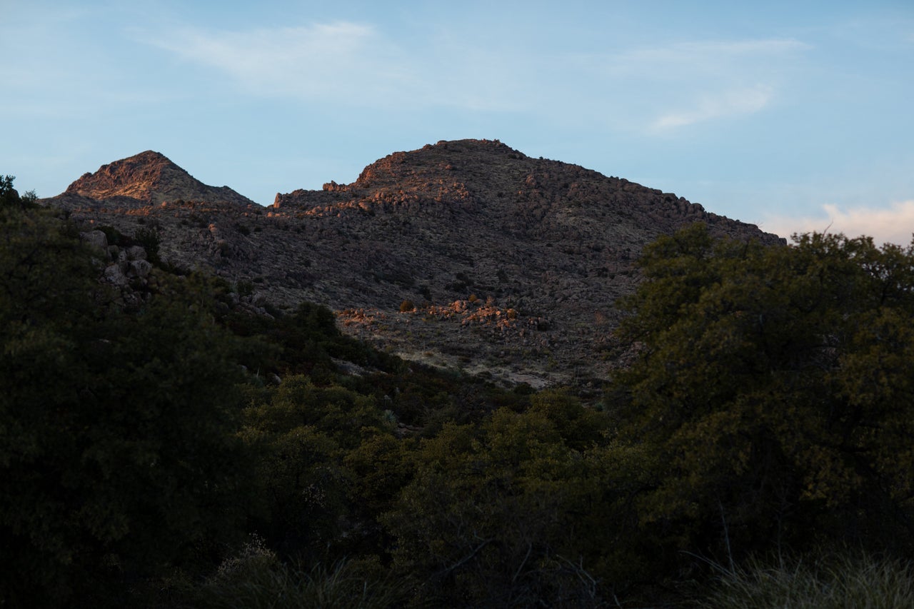 The sun sets at Oak Flat on Jan. 10. The trees and the rare edible acorns they produce have long been a crucial part of some religious and spiritual ceremonies for the Apache people.