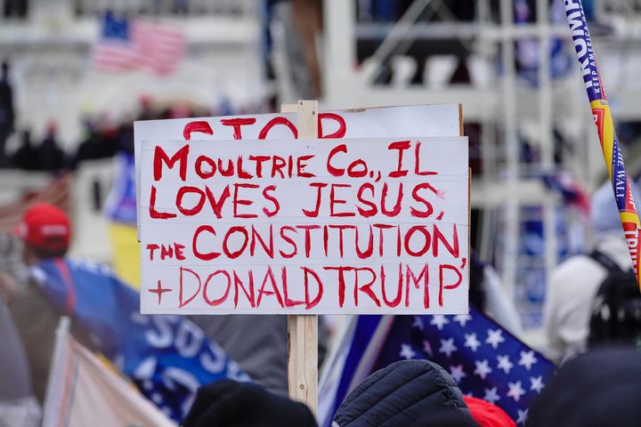 A sign referencing Jesus is held aloft during a "Stop the Steal" rally in support of President Donald Trump in Washington, D.