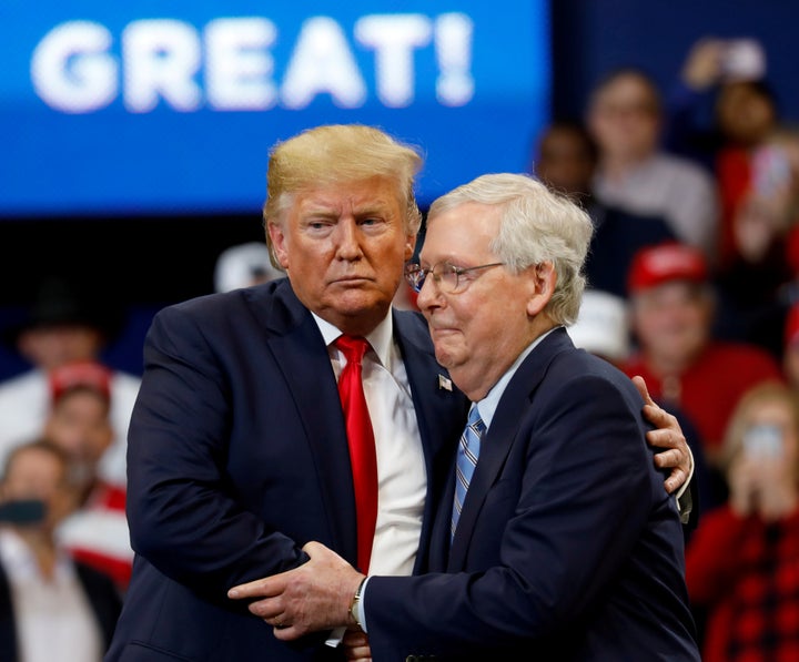 Senate Majority Leader Mitch McConnell (R-Ky.) hugs President Donald Trump at a campaign rally in Lexington, Kentucky, in November 2019. 