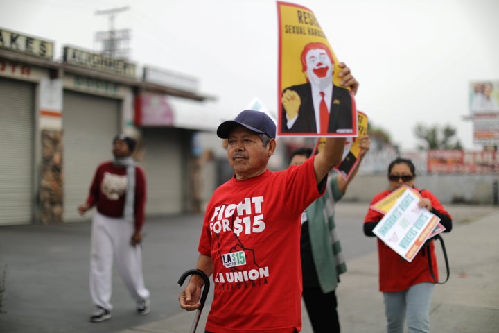 Fast-food workers protest outside of a McDonald's in Los Angeles on May 24, 2017, as part of the Fight for $15 movement. Fight for $15 is calling on President-elect Joe Biden to fire the NRLB's general counsel, Peter Robb.