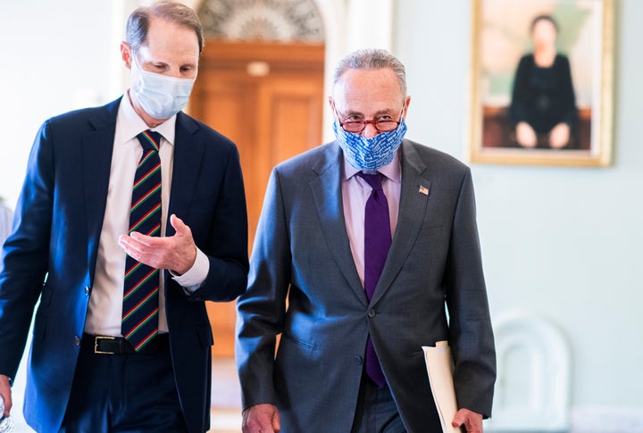 Senate Democratic Leader Chuck Schumer (D-N.Y.), right, and Sen. Ron Wyden, (D-Ore.), will be instrumental to negotiations on this COVID-19 relief and economic recovery package.