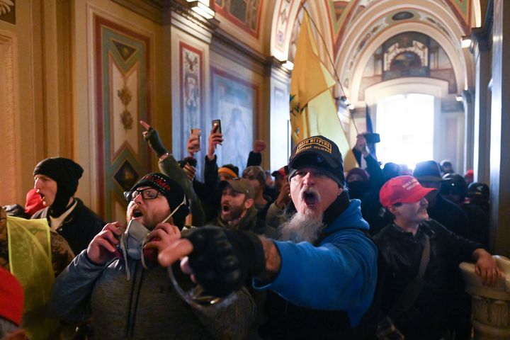 Supporters of President Donald Trump rampage through the U.S. Capitol on Jan. 6 as Congress met to count the Electoral Votes that named Joe Biden the winner of the November election.