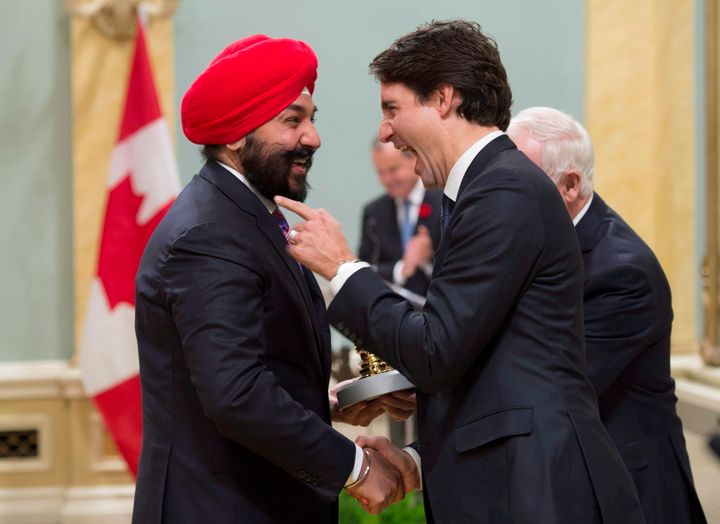 Prime Minister Justin Trudeau jokes with Minister of Innovation, Science and Economic Development Navdeep Singh Bains at Rideau Hall on Nov. 4, 2015 in Ottawa. 