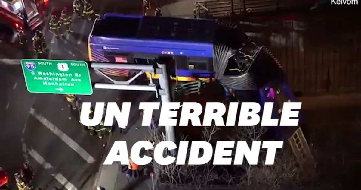 New York accident leaves bus hanging over the road