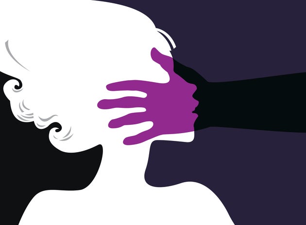 Man slapping and abusing young woman. Concept. Purple color used because it is international color symbol of violence against women. 