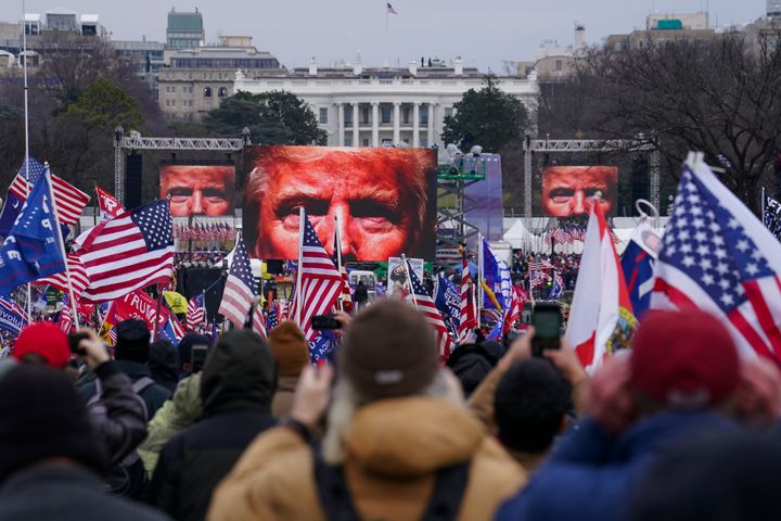 In this Jan. 6, 2021 file photo, Trump supporters participate in a rally in Washington. An AP review of records finds that members of President Donald Trump’s failed campaign were key players in the Washington rally that spawned a deadly assault on the U.S. Capitol last week. (AP Photo/John Minchillo)