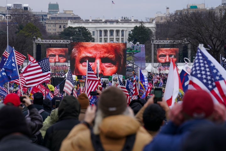 In this Jan. 6, 2021 file photo, Trump supporters participate in a rally in Washington. An AP review of records finds that members of President Donald Trump’s failed campaign were key players in the Washington rally that spawned a deadly assault on the U.S. Capitol last week. (AP Photo/John Minchillo)