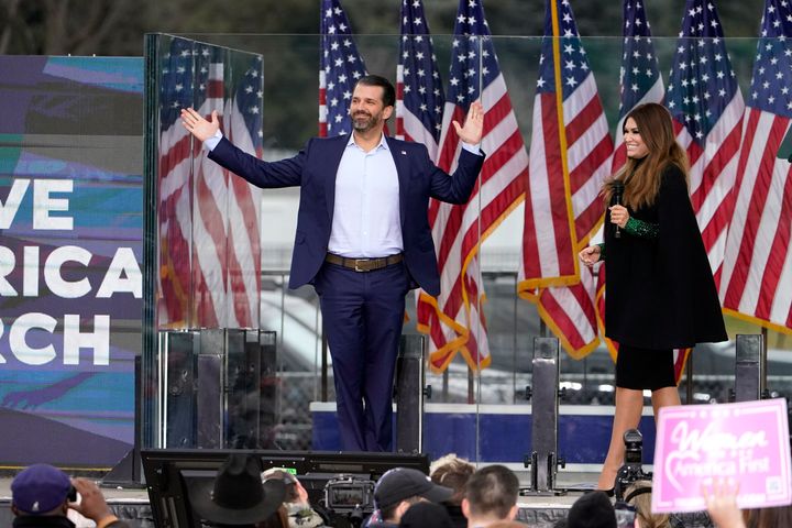 Donald Trump Jr. arrives on stage as Kimberly Guilfoyle speaks Wednesday, Jan. 6, 2021, in Washington, at a rally in support 