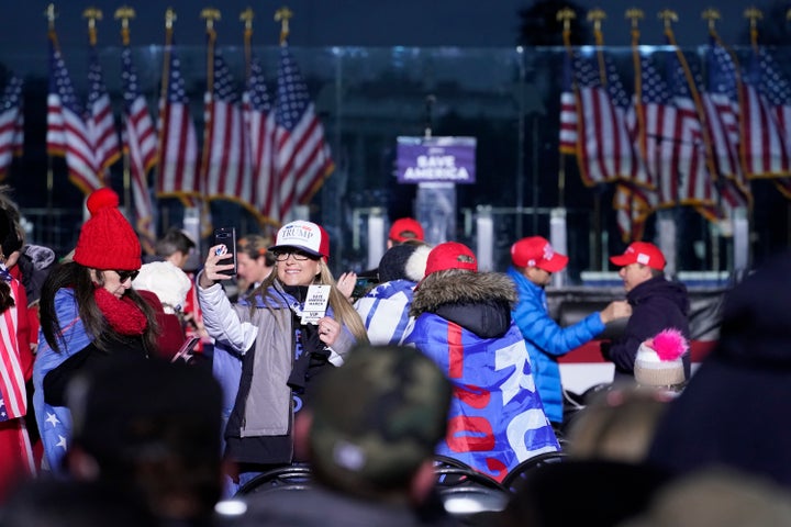 In this Jan. 6, 2021 file photo people arrive to attend a rally in support of President Donald Trump. An AP review of records