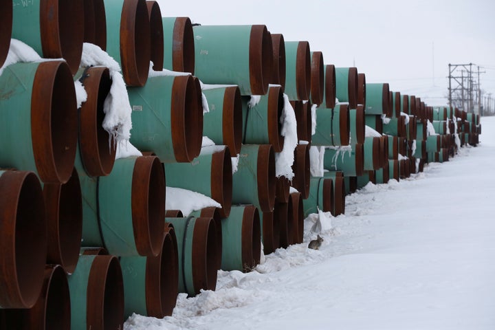 Pipes to be used for the Keystone XL pipeline project sit in the snow in Gascoyne, N.D., on Jan. 25, 2017.