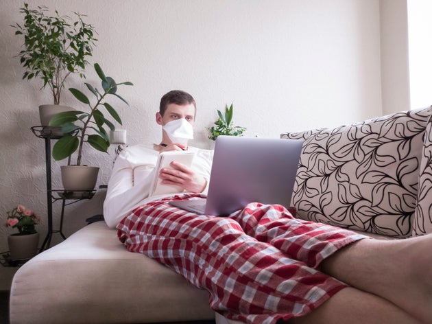 Man works at home during quarantine. Remote work for the period of the coronavirus pandemic.
