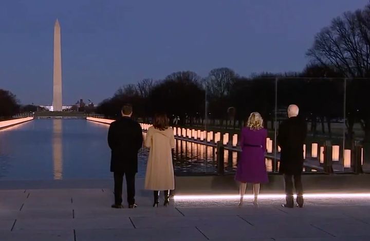 Joe Biden (right) with spouse Jill Biden and Kamala Harris (center) with spouse Doug Emhoff at the coronavirus memorial event at the Lincoln Memorial.