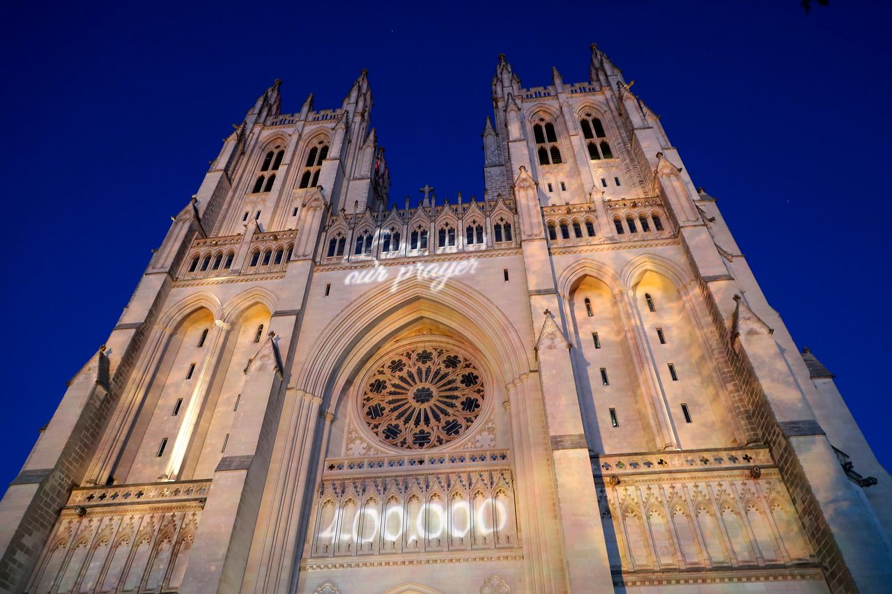 The grim COVID-19 milestone was projected onto the National Cathedral to honor the pandemic's victims.