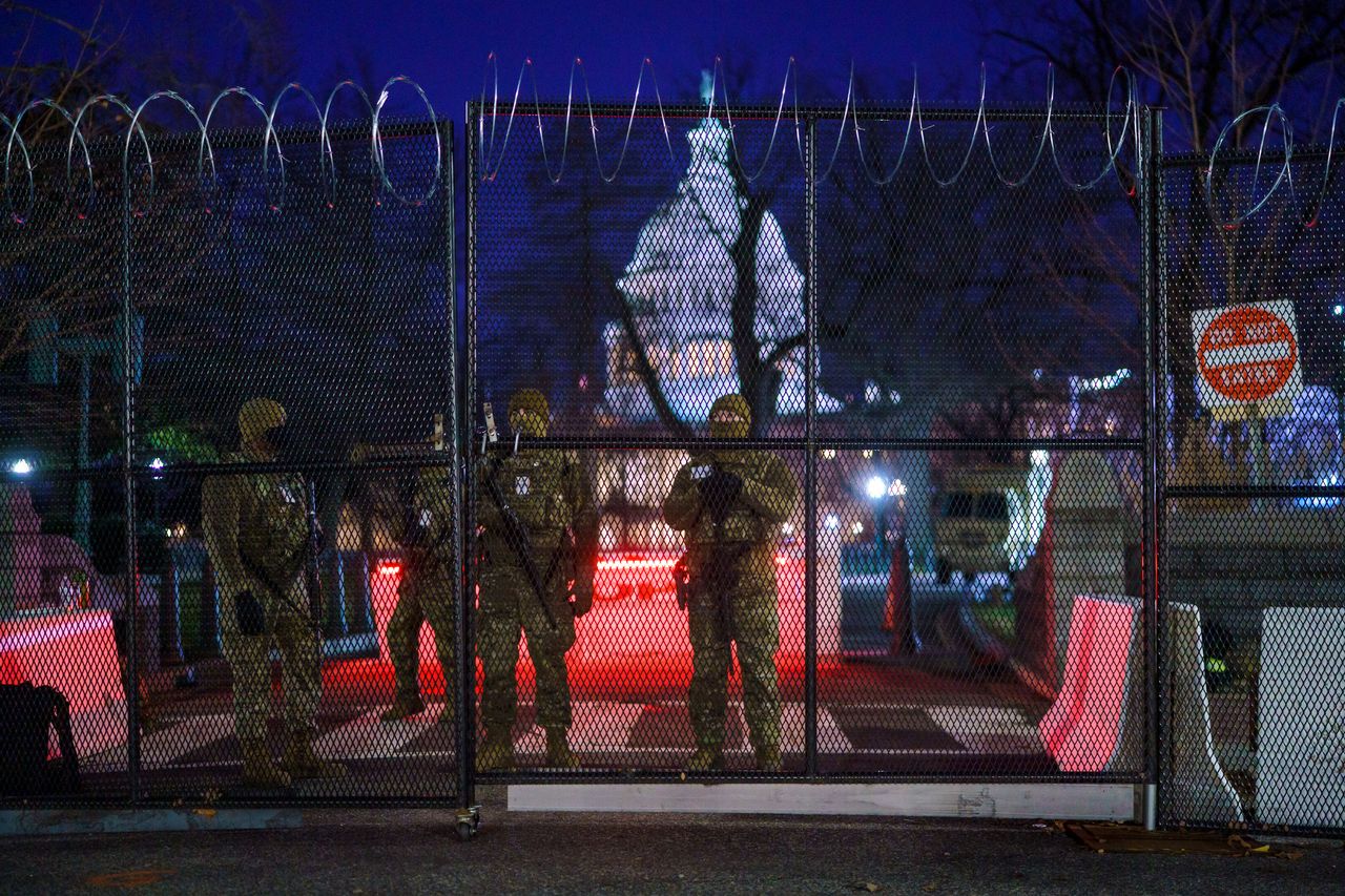 National Guard troops reinforce the security zone on Capitol Hill in Washington, on Tuesday.