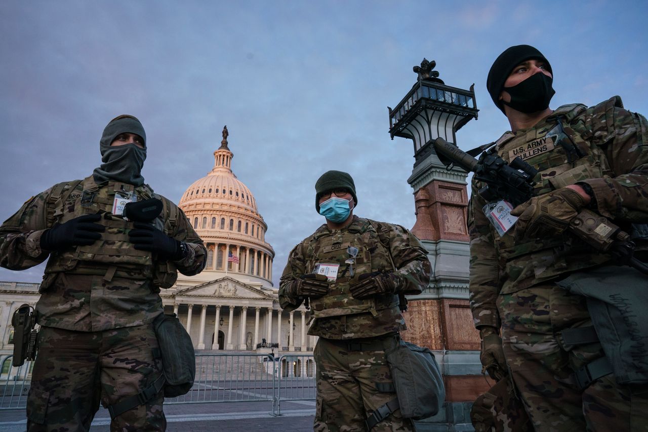 National Guard troops reinforce the security zone on Capitol Hill in Washington on Tuesday.