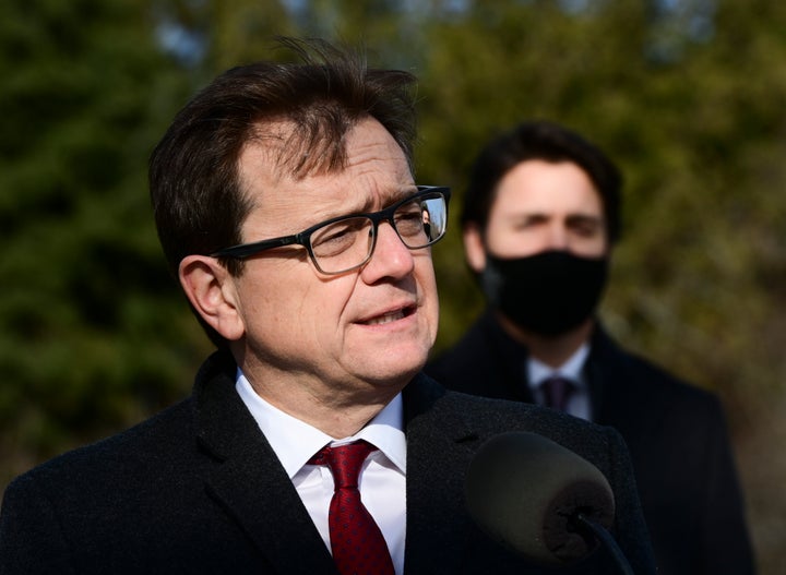 Environment Minister Jonathan Wilkinson, left, and Prime Minister Justin Trudeau hold a press conference in Ottawa on Nov. 19, 2020. 