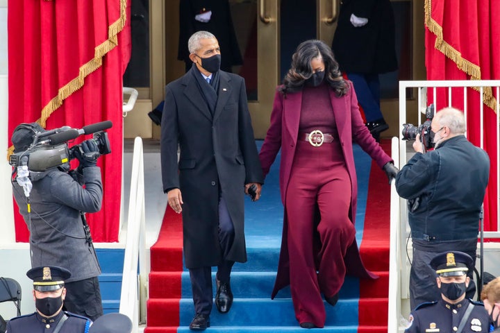 Former President Barack Obama and former first lady Michelle Obama arrive.