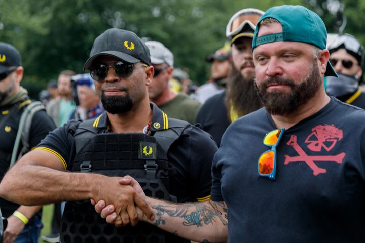 Leader of the Proud Boys Enrique Tarrio (left) and prominent member Joe Biggs (right) are now facing federal charges.