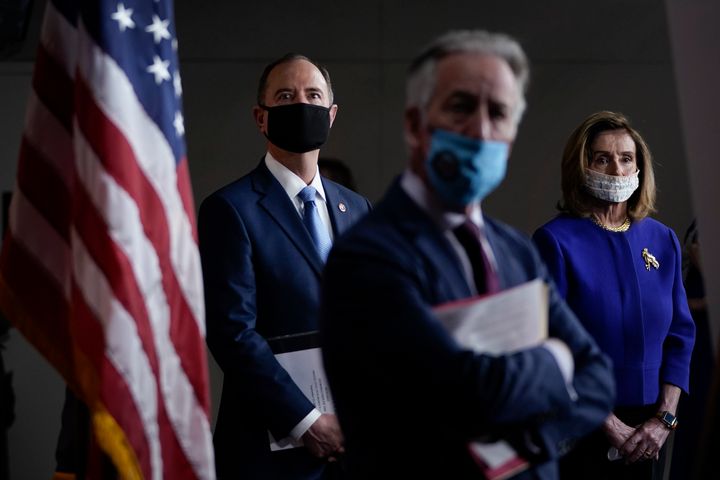Rep. Adam Schiff (D-Calif.), Rep. Richard Neal (D-Mass.) and Speaker of the House Nancy Pelosi (D-Calif.) attend a news conference in September 2020. Congressional Democrats are renewing efforts to obtain copies of former President Donald Trump's tax returns. 