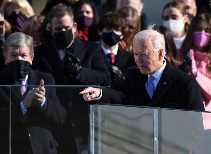 U.S. President Joe Biden acknowledges guests after delivering his inauguration speech on January 20, 2021, in Washington, DC.