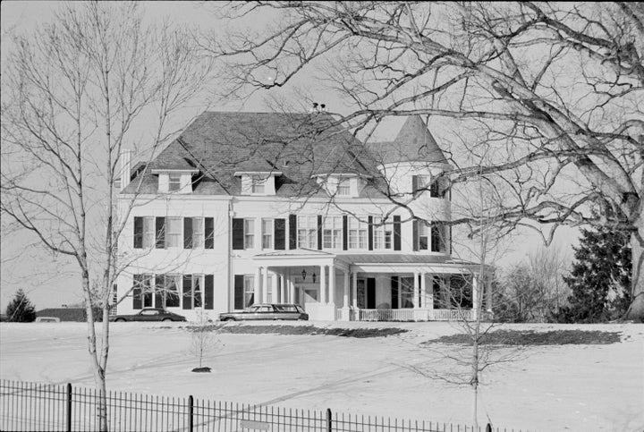 The house was painted white in the 1960s, as seen in this photo from January 1977.