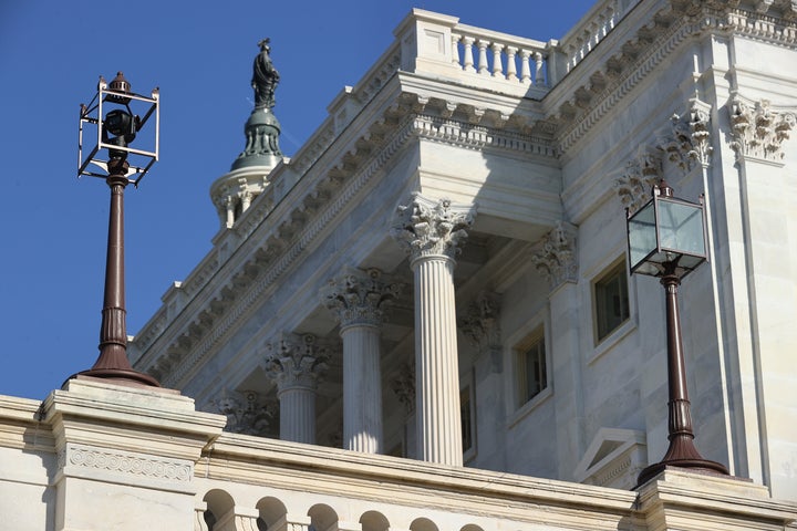 A surveillance camera is mounted inside a lamp on the West Front of the U.S. Capitol on Jan. 13, 2021, in Washington, D.C.