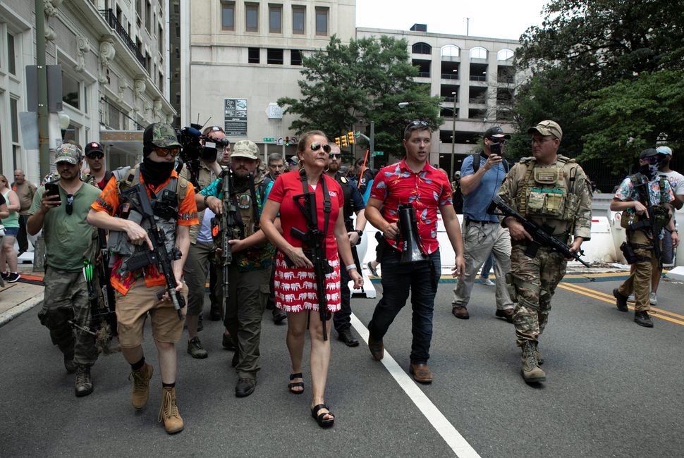 Virginia state Sen. Amanda Chase walks through the crowd at a pro-gun rally in Richmond, Virginia, on July 4, 2020. She also 
