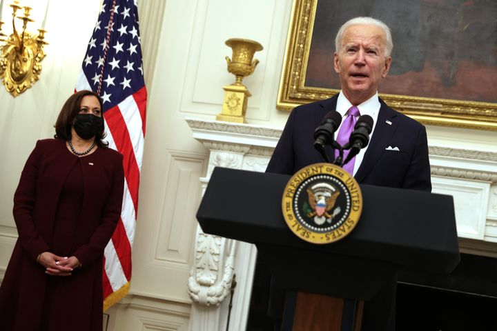 President Joe Biden, with Vice President Kamala Harris, speaks at the State Dining Room of the White House on Thursday about his administration’s COVID-19 response.