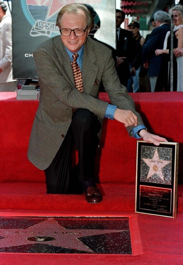 King with his plaque after his star on the Hollywood Walk of Fame was unveiled May 8, 1997.