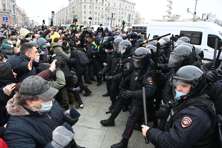 Protesters clash with riot police during a rally in support of jailed opposition leader Alexei Navalny in downtown Moscow.