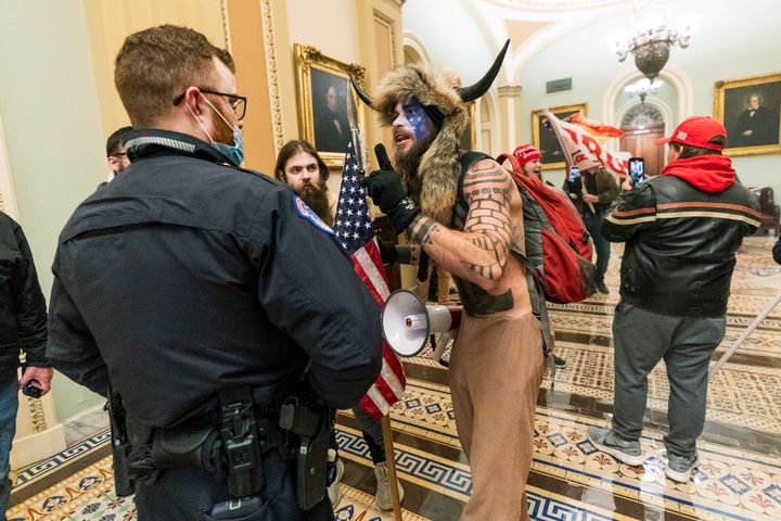 FILE - In this Jan. 6, 2021, file photo supporters of President Donald Trump are confronted by U.S. Capitol Police officers o