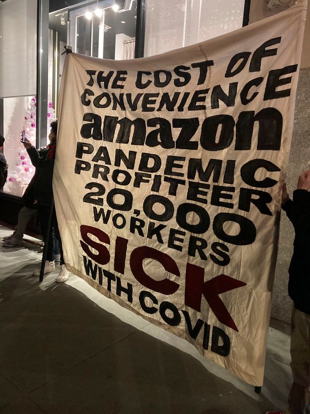 A protest outside of Amazon CEO Jeff Bezos' New York City apartment in December. Since the start of the pandemic, he has made hundreds of billions of dollars thanks to the labor of tens of thousands of people working in unsafe conditions.